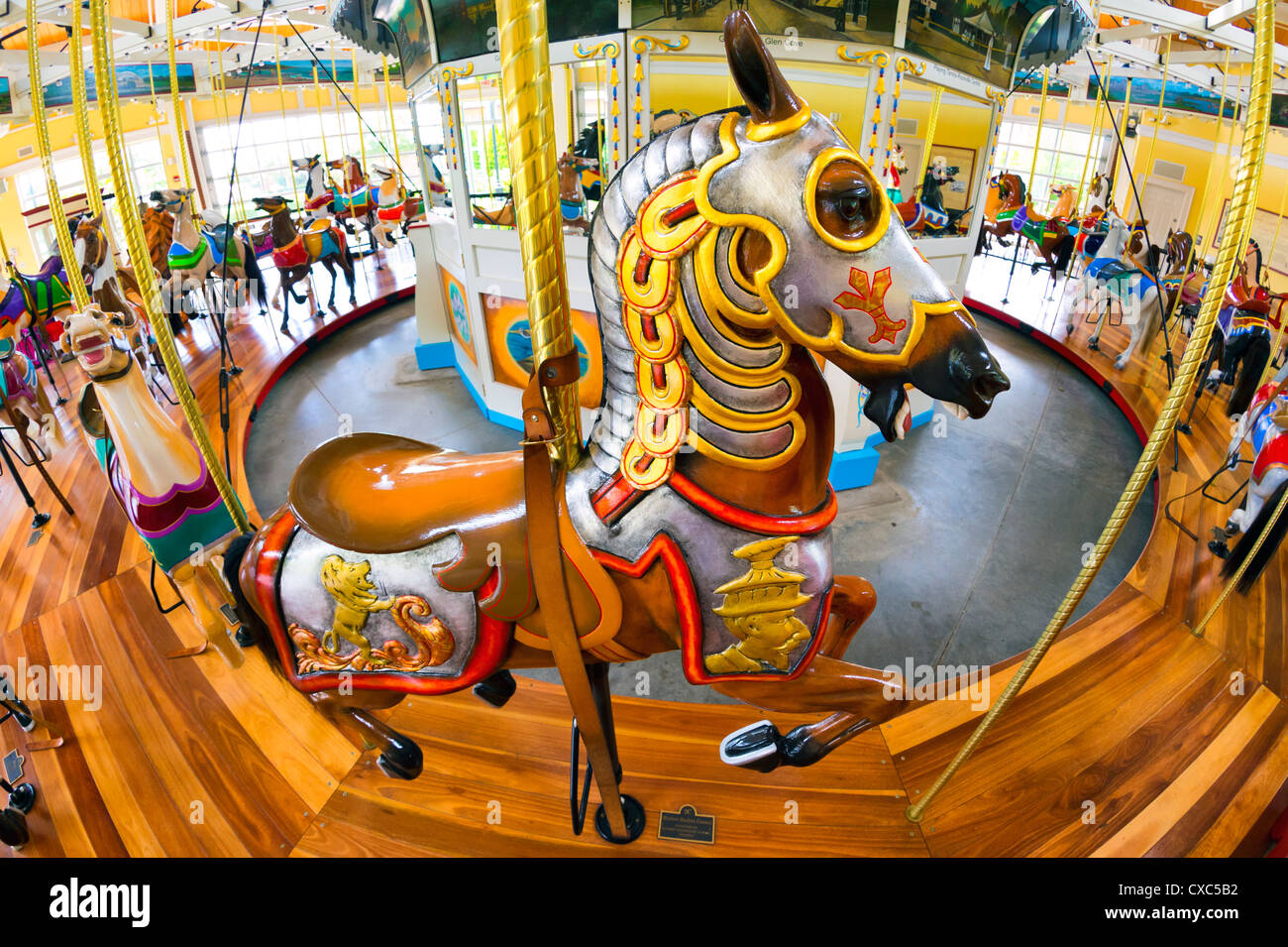 Historic Nunley's Carousel, with horse wearing armor seen from above, 180 degree fisheye view, Long Island, New York USA 2012 Stock Photo