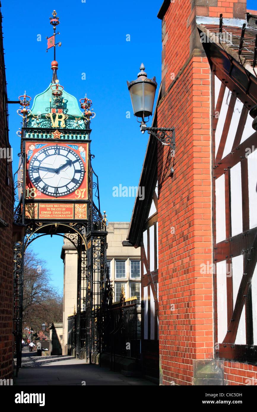 Pedestrian bridge over Eastgate, with clock, Chester, Cheshire, England, United Kingdom, Europe Stock Photo