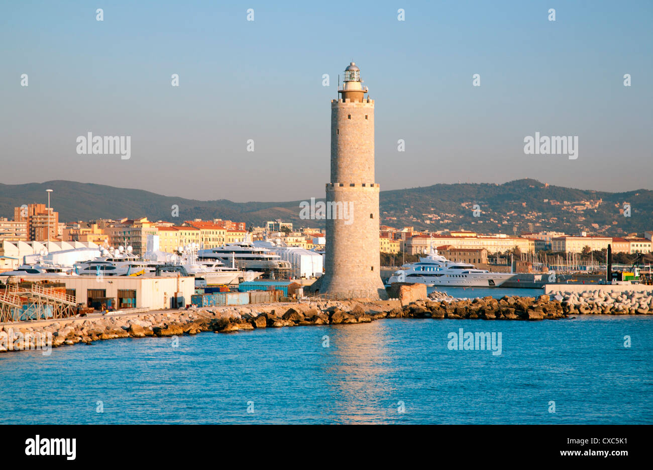 View of shipyard showing the Lighthouse of Livorno, Livorno, Tuscany, Italy, Europe Stock Photo