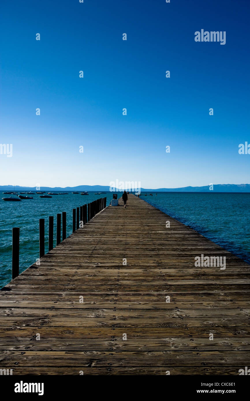 Long wooden pier at Lake Tahoe, NV with clear blue sky Stock Photo - Alamy