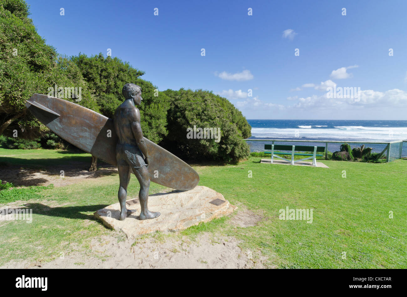 Park overlooking the sea with a surfer sculpture celebrating the history of surfing, Yallingup Beach, Western Australia Stock Photo
