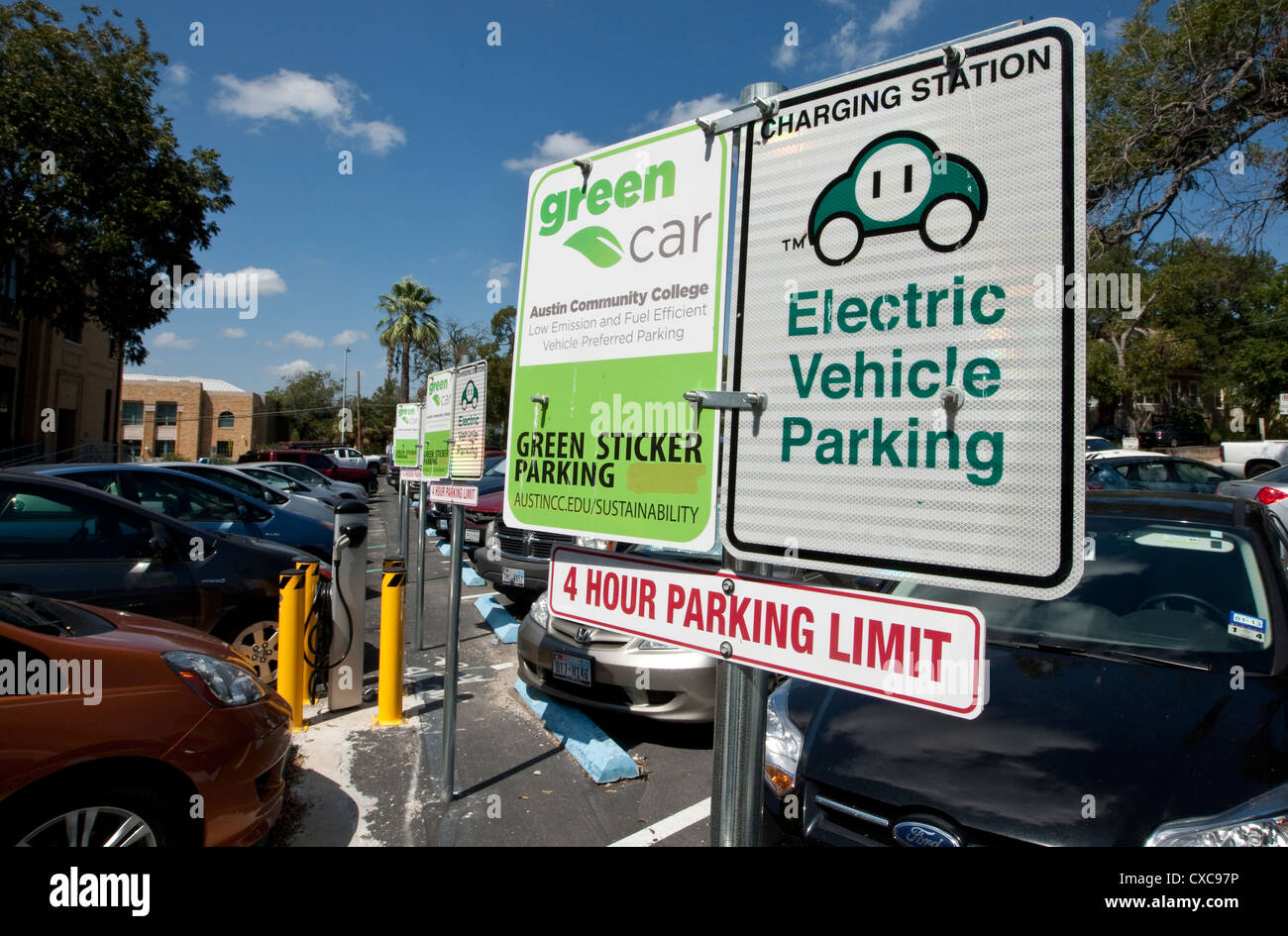 Sign indicating special parking spots reserved for electric vehicle or green sticker parking for hybrid cars in Texas Stock Photo