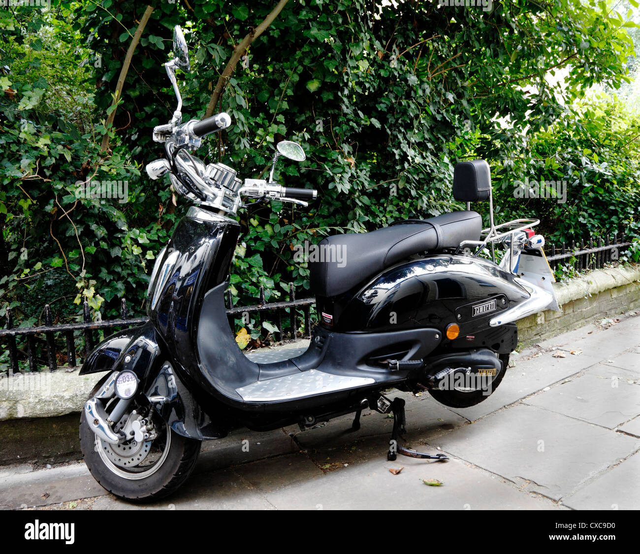 Black motor scooter Stock Photo - Alamy