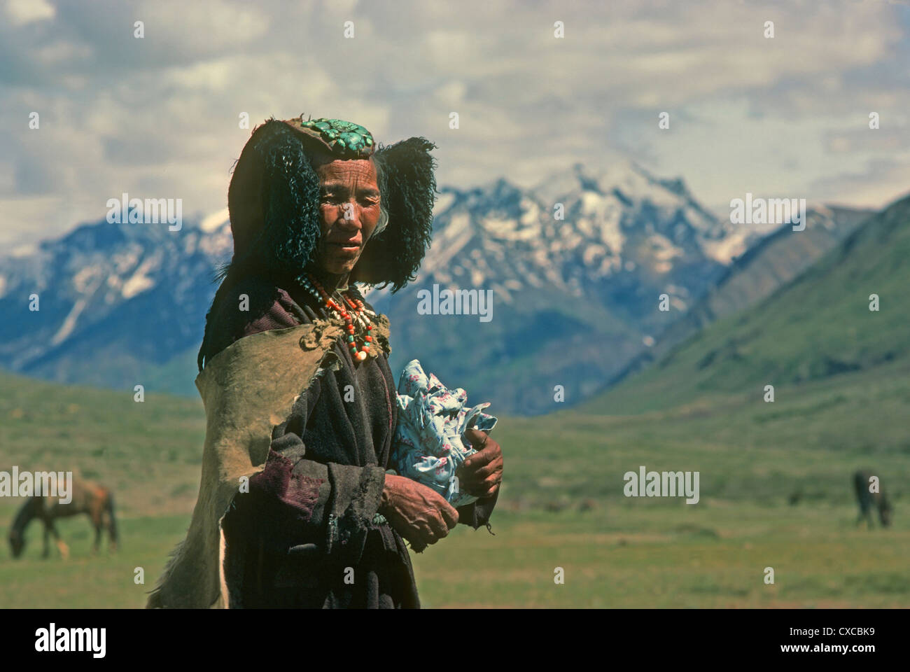 Woman wearing traditional lapis lazuli hat Zanskar Valley Ladakh India Stock Photo