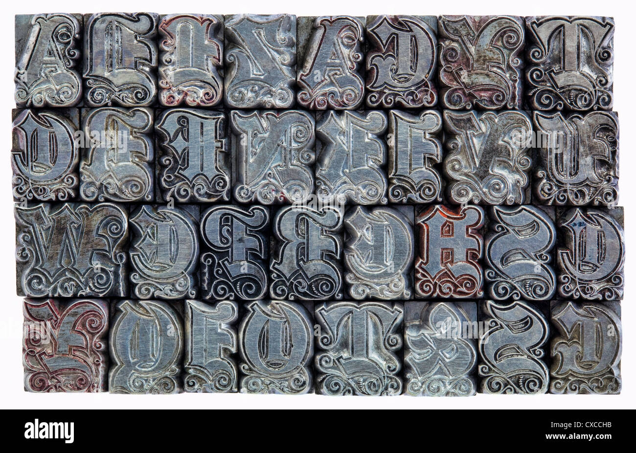 random alphabet letters in decorative metal letterpress type initials