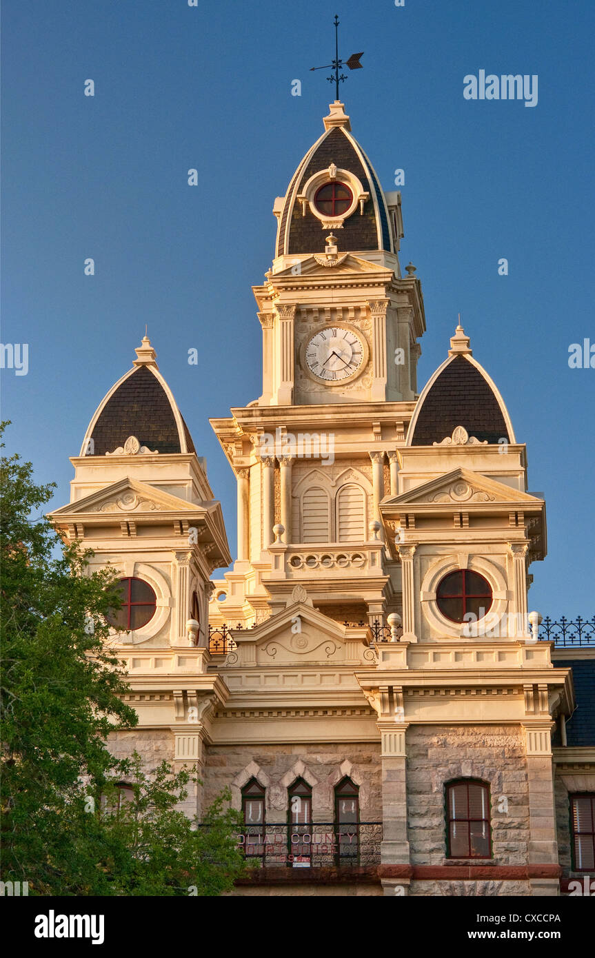 Clock tower and turrets topped with cupolas at Goliad County Courthouse (second empire/neo-gothic style), Goliad, Texas, USA Stock Photo
