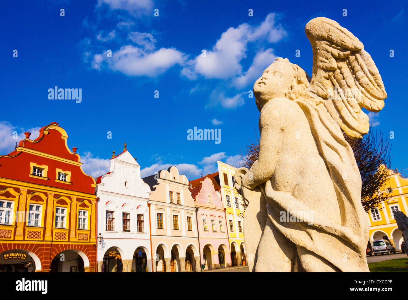 Angel statue and colorful houses at Telch Main Square. Czech Republic Stock Photo