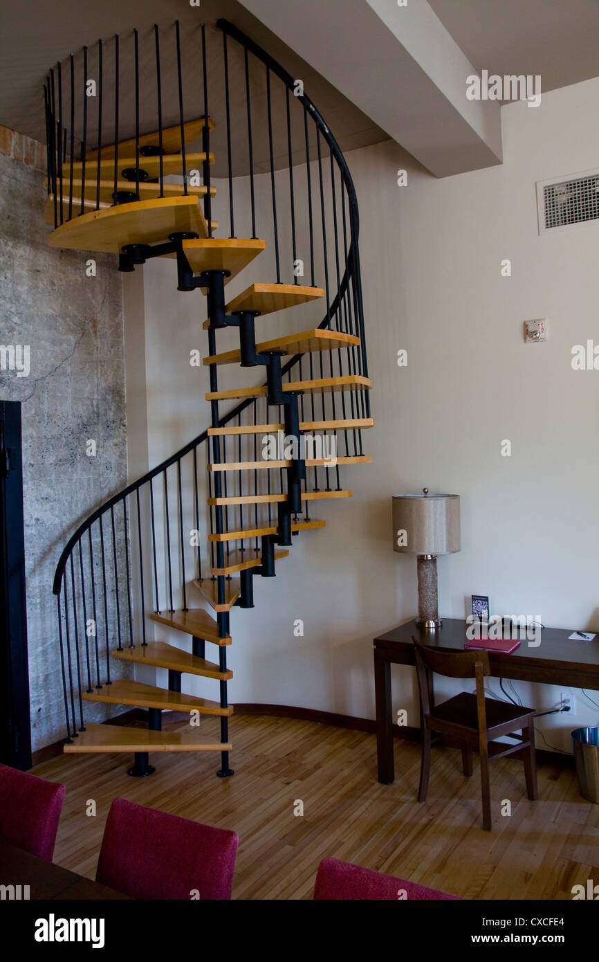 A spiral staircase leads to a rooftop terrace, Hotel 71, Quebec City, Canada Stock Photo