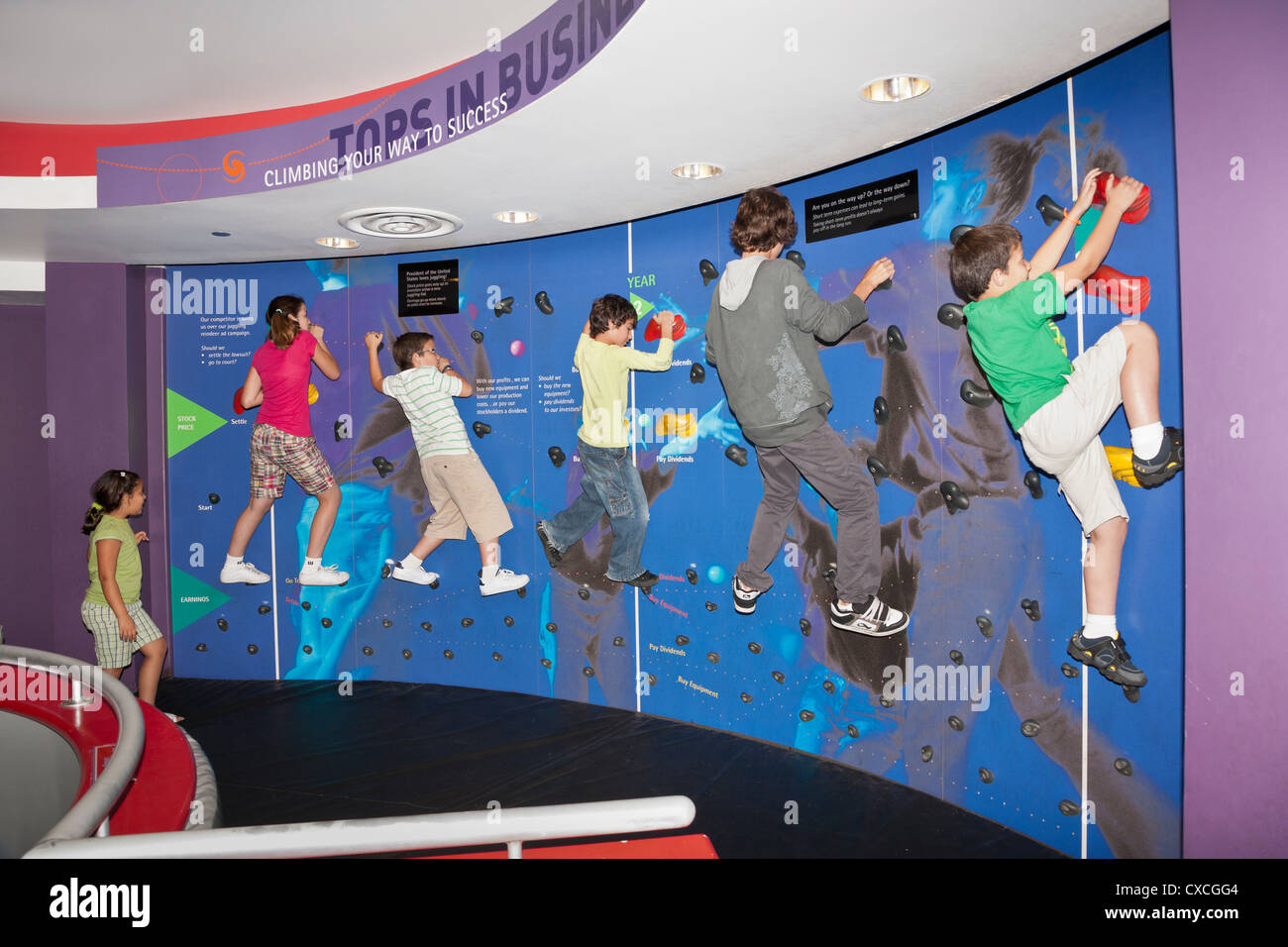 Kids climbing a wall at Chicago Science and industry museum Stock Photo