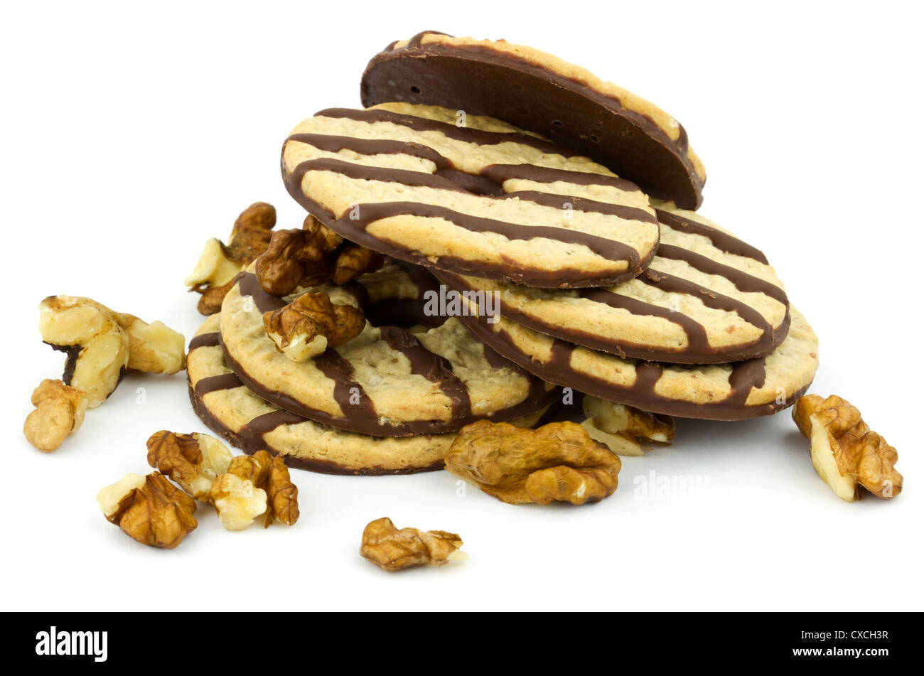 Heap of delicious chocolate striped cookies with chopped nuts isolated
