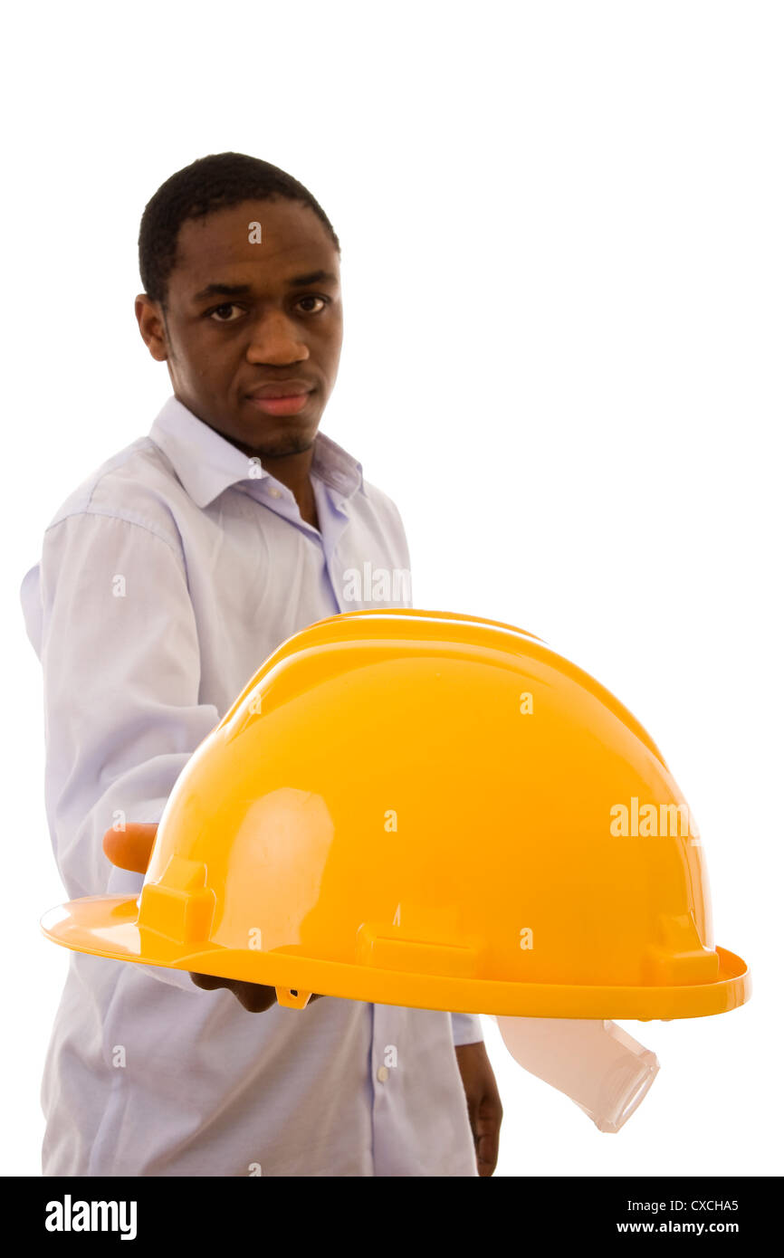 A man giving you a yellow helmet to protect your head Stock Photo - Alamy