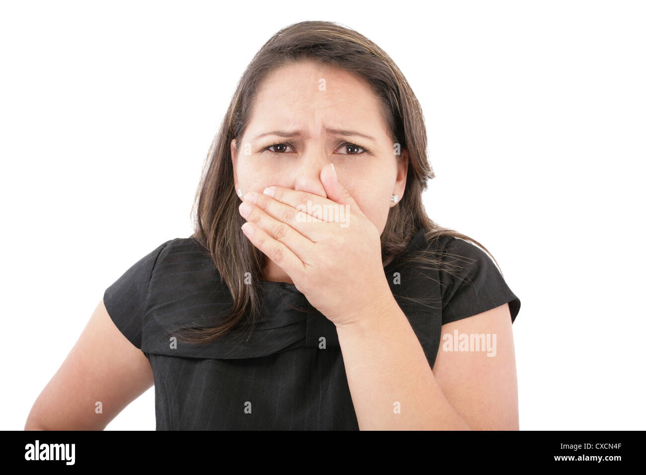 Covering her nose after a bad smell Stock Photo Alamy