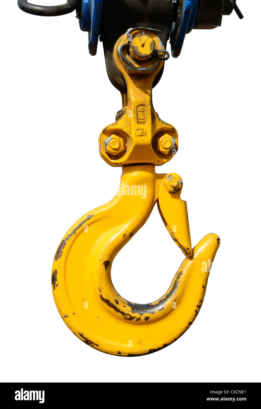 Yellow crane hoist hook with safety latch Stock Photo