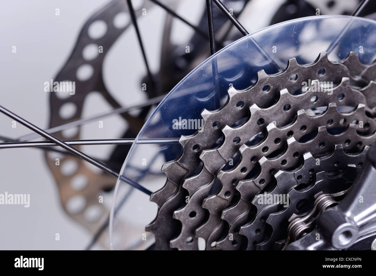Close up detail of a bicycle rear gears and disc brakes Stock Photo