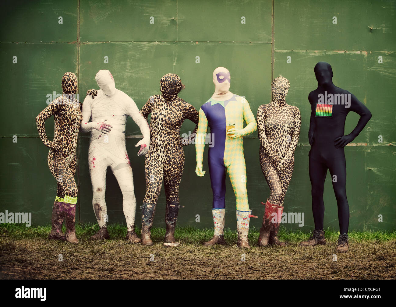 Gregor Lawson, Ali and Fraser Smeaton inventors of the Morphsuit ,with friends at the T In The Park Festival Stock Photo