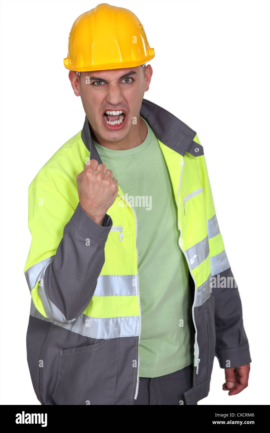 Aggressive construction worker rejoicing Stock Photo