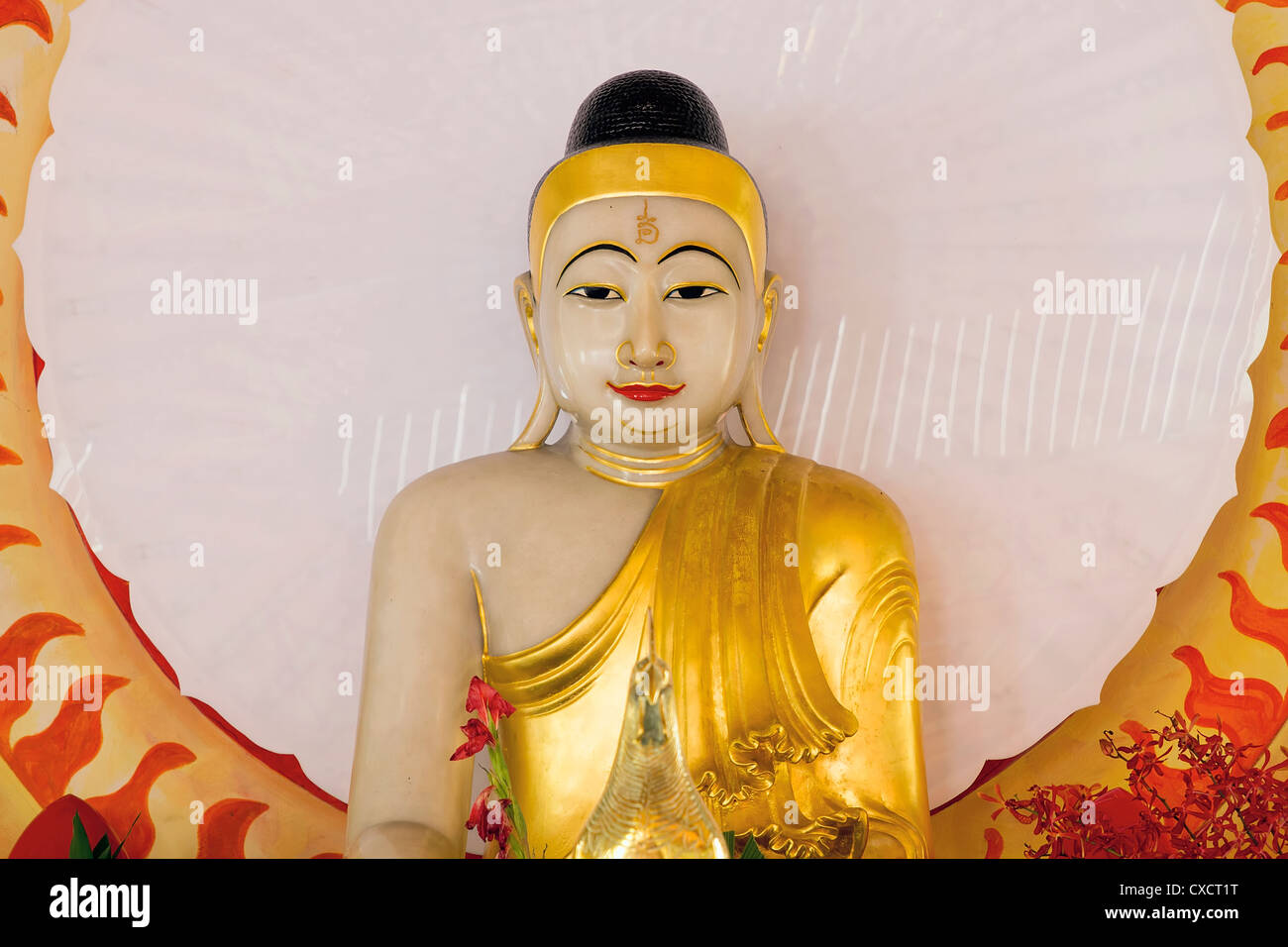 Gold Gilt Buddha Statue Sitting in Thailand Temple Altar Stock Photo