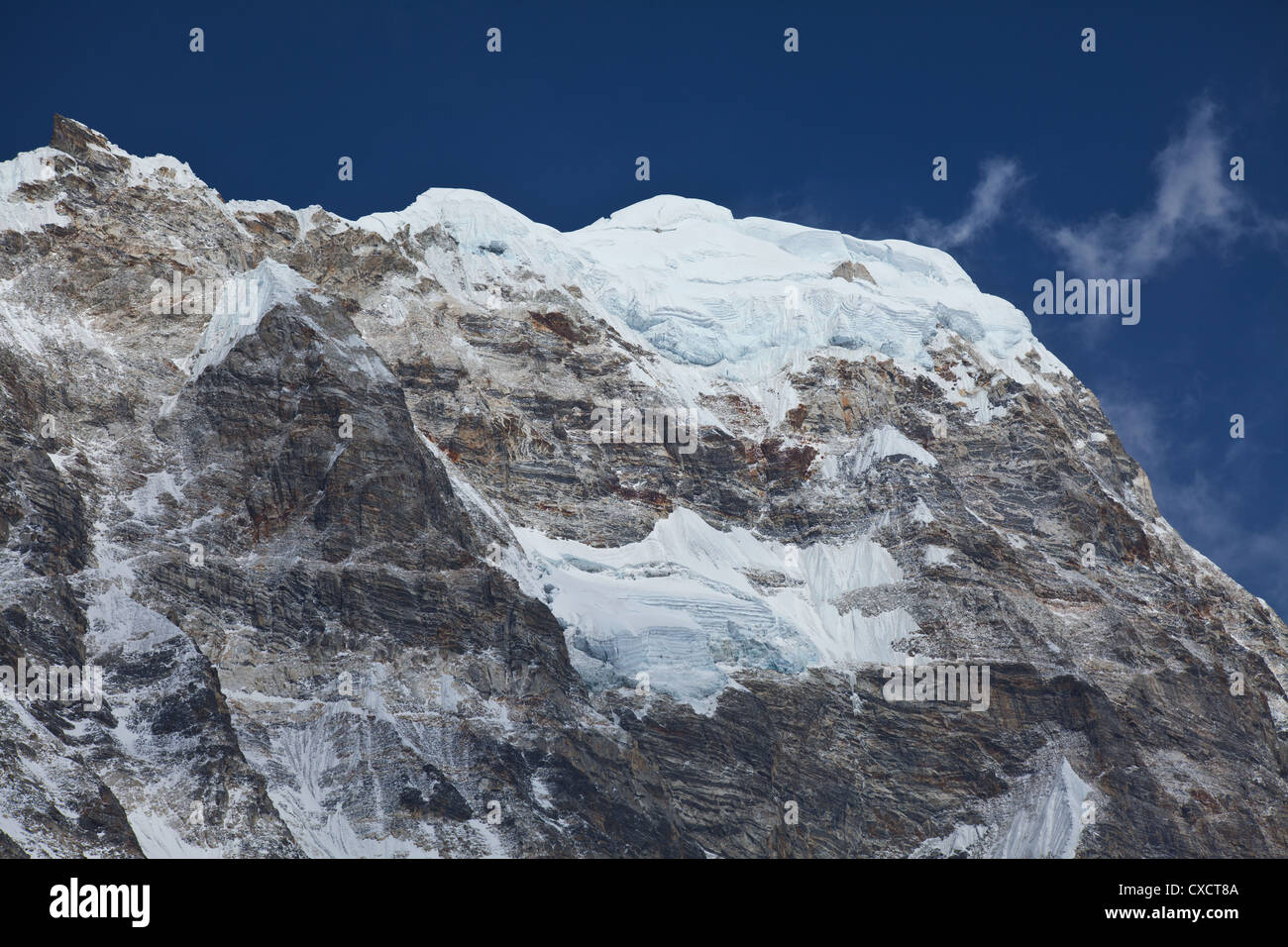 Side of a huge snowcapped mountain, Langtang Valley, Nepal Stock Photo