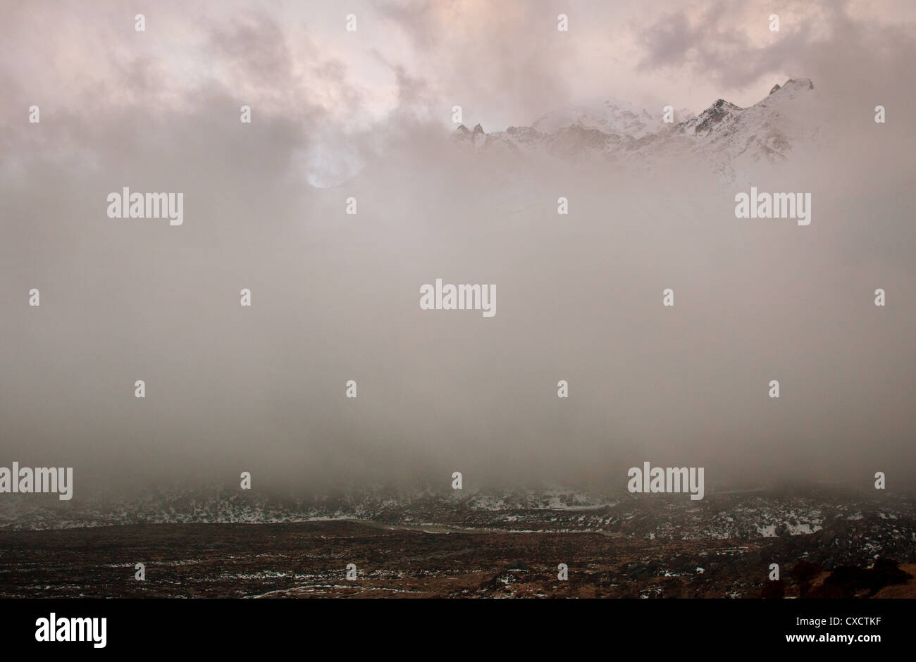 Thick cloud covering mountains along the Langtang valley, Nepal Stock Photo