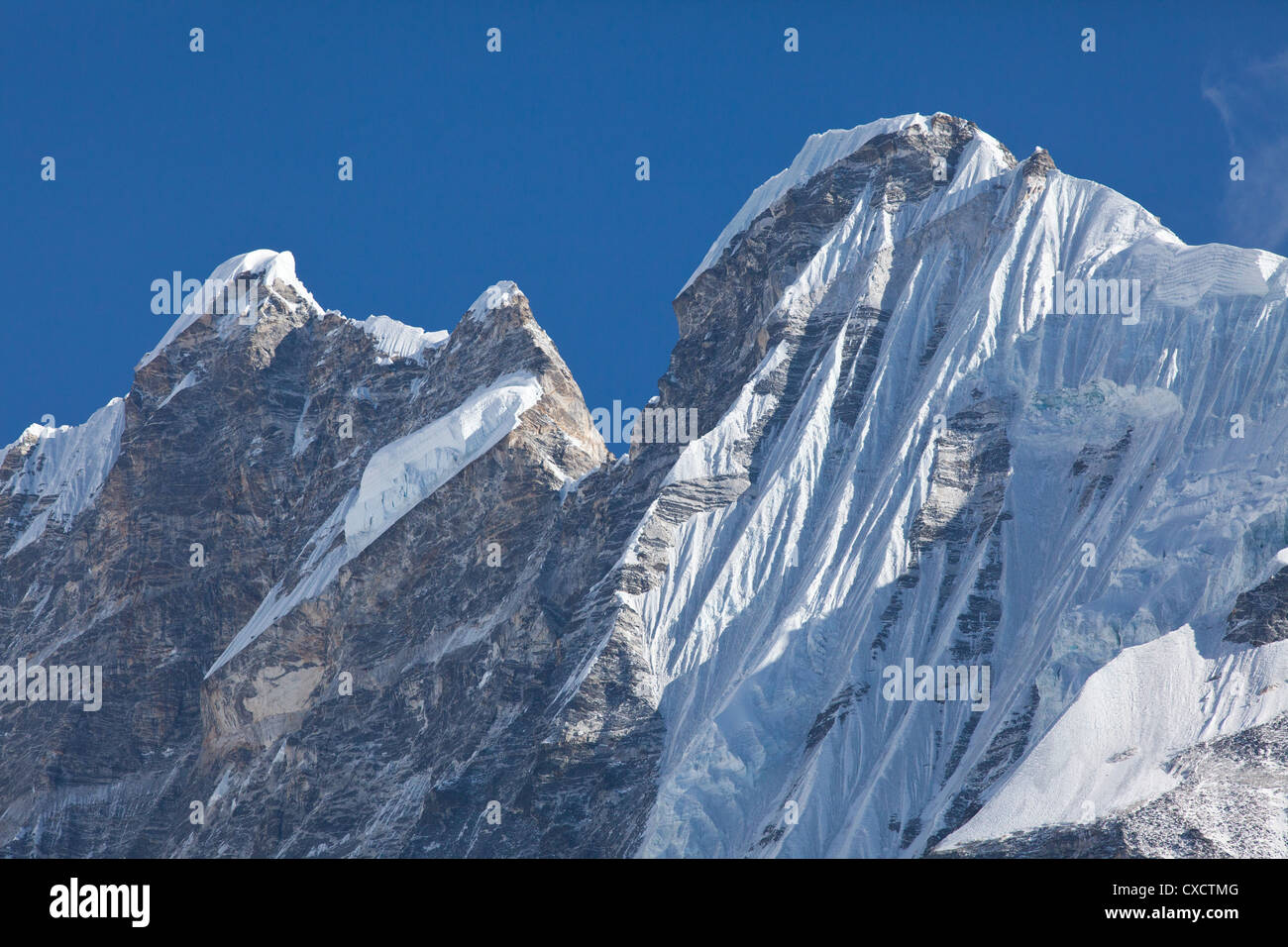 Stunning huge snowcapped mountain in the Himalayas, Nepal Stock Photo