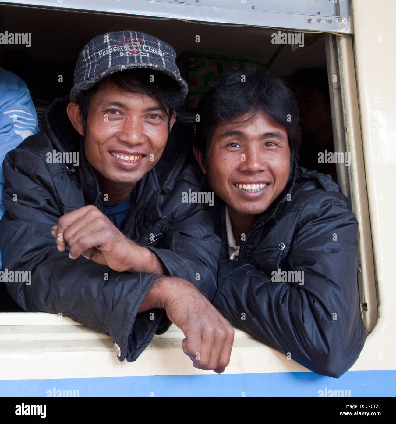 Myanmar, Burma. Burmese Passengers on their Train at the Kalaw Train Station. Stock Photo