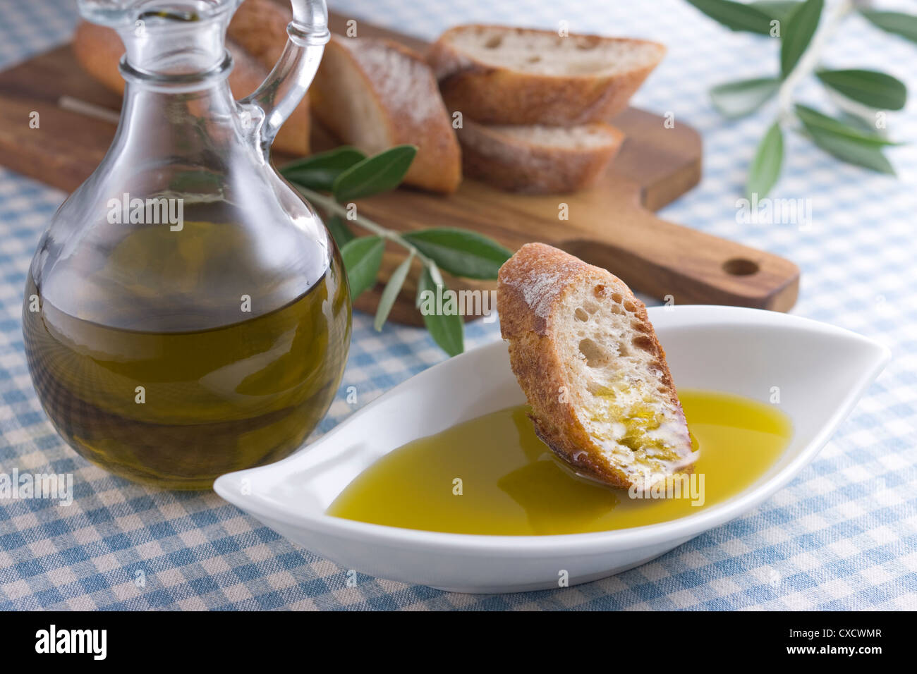 Dipping Bread Into Olive Oil Stock Photo Alamy Dipping Bread Into Olive Oil Stock Photo Alamy