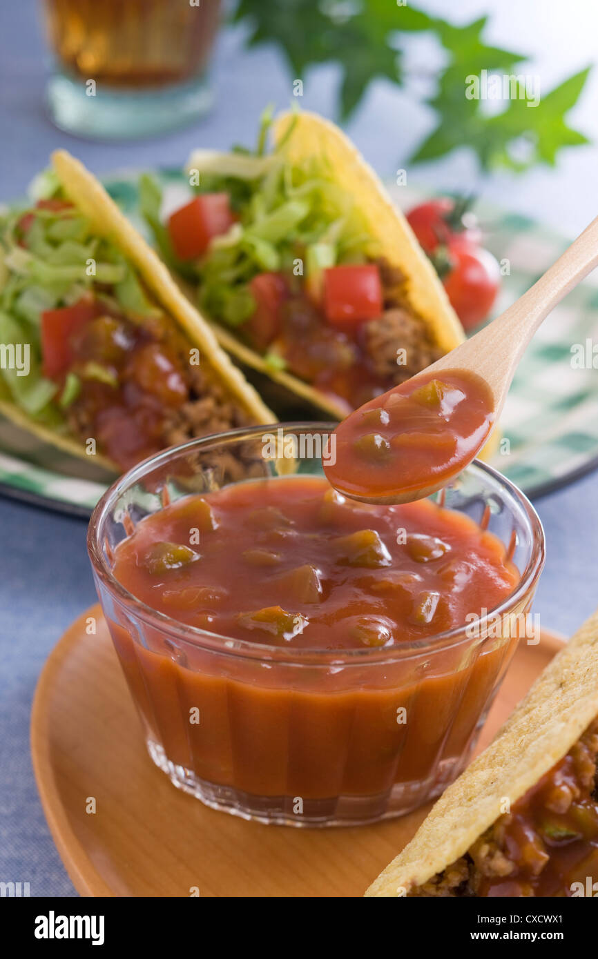 Scooping Salsa with Spoon Stock Photo