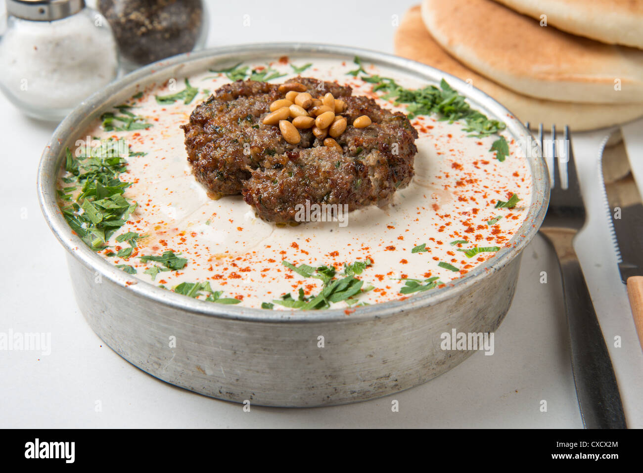 Seniyeh Ground Lamb with Tahini a mideastern dish popular in Syria