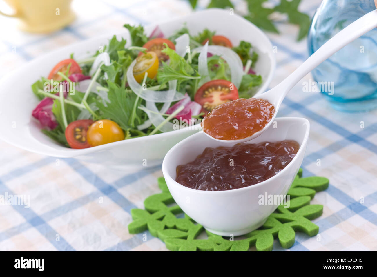 Scooping Ponzu Jelly Dressing with Spoon Stock Photo