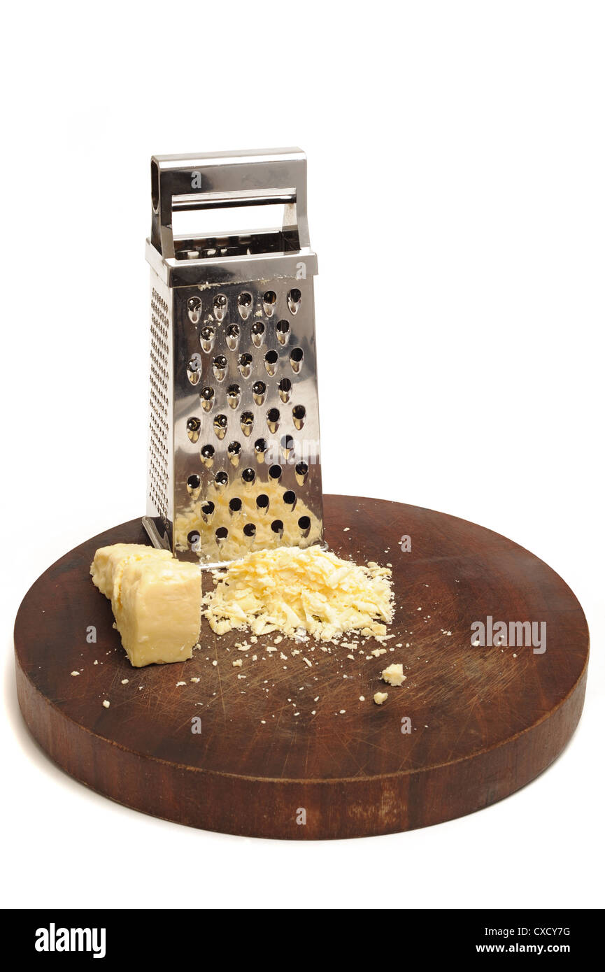 cheese grater with grated cheese Stock Photo