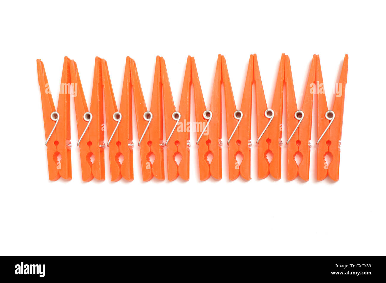 Orange clothes pegs Stock Photo Alamy