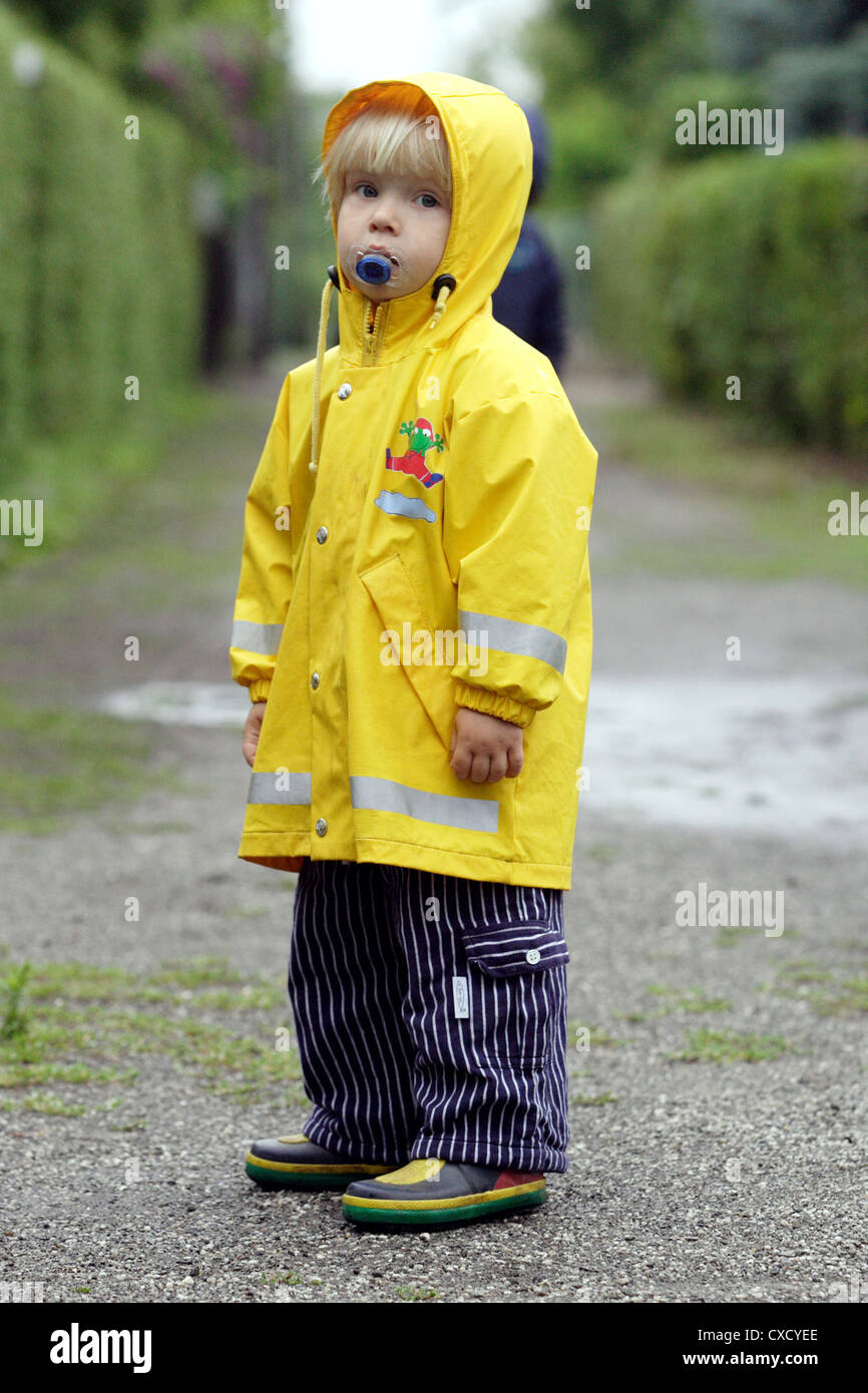 Berlin, toddler in rainwear Stock Photo