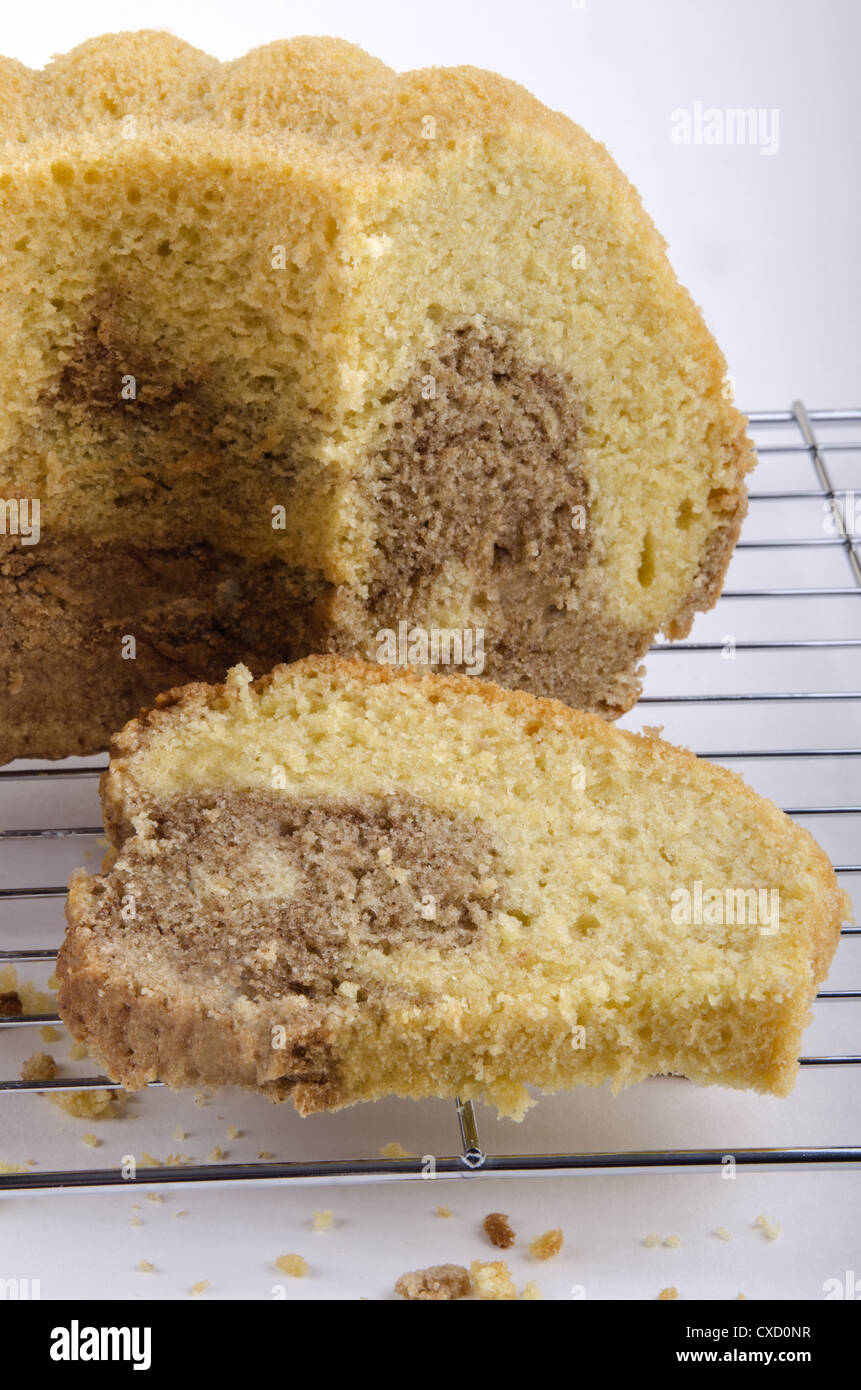 Marbled Chocolate marzipan Gugelhupf on a baking rack Stock Photo - Alamy