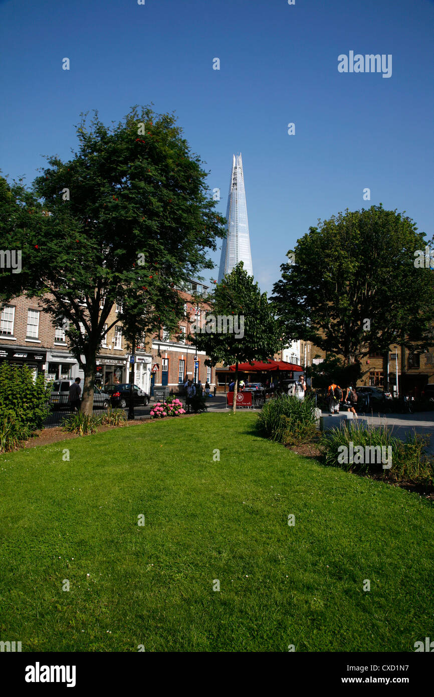 View out from Tanner Street Park to Bermondsey Street and the Shard, Bermondsey, London, UK Stock Photo