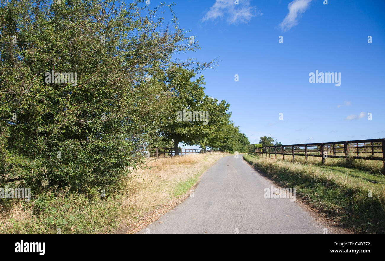 Country road with fence hi-res stock photography and images - Alamy