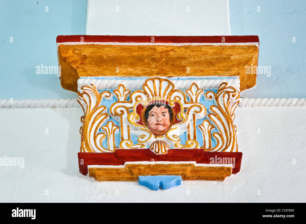 Cherub in low relief detail at base of vault rib, church at Mission Espiritu Santo, Goliad State Park, near Goliad, Texas, USA Stock Photo