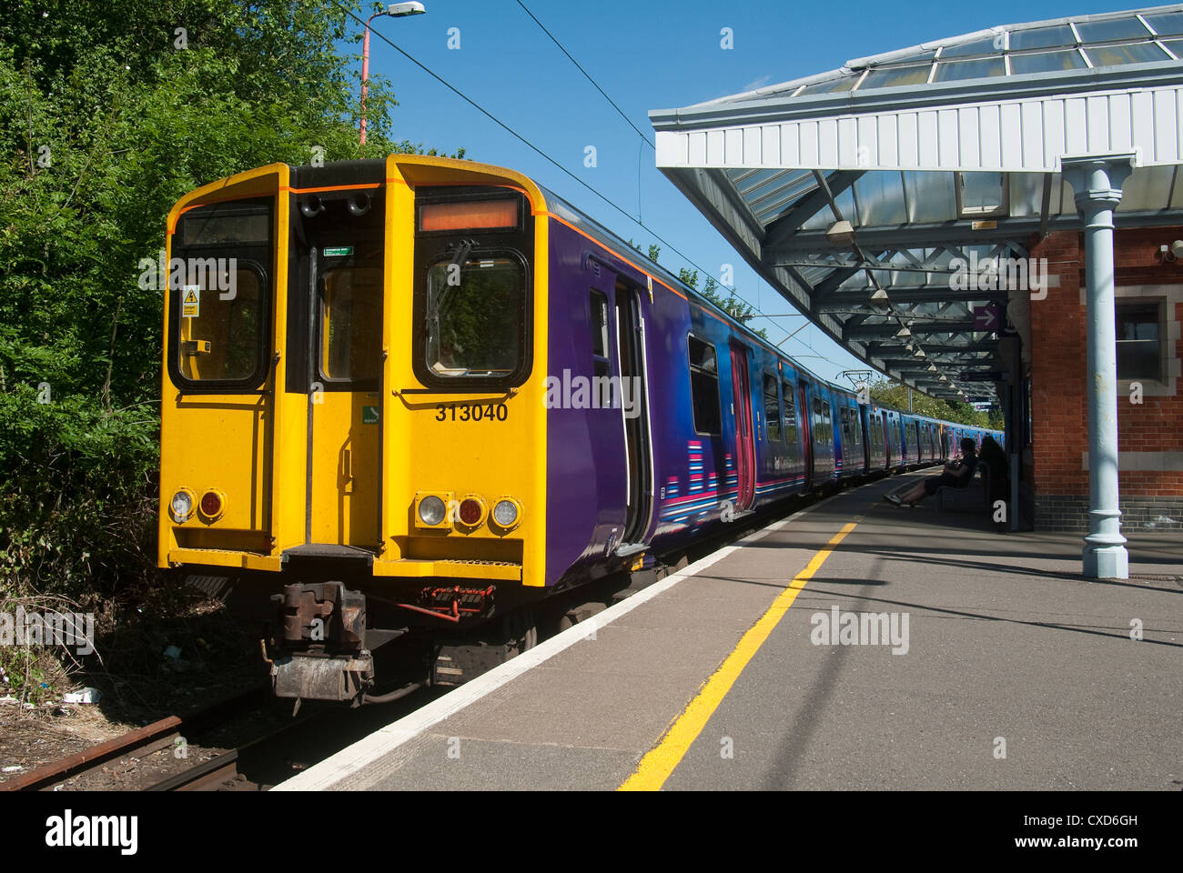First Capital Connect train waiting at a railway station in England ...
