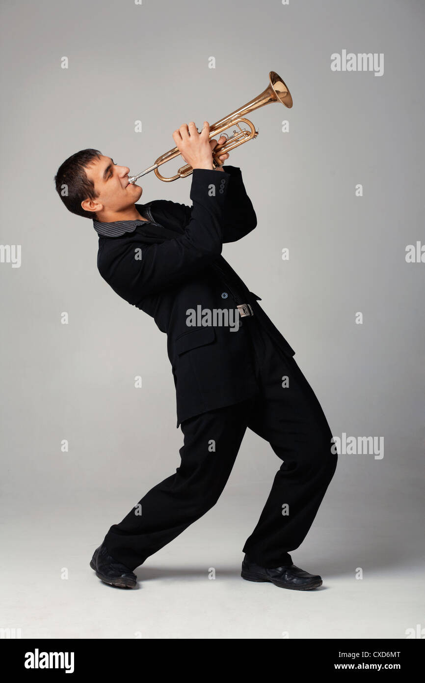 Talented boy playing the trumpet hi-res stock photography and images -  Alamy, playing 