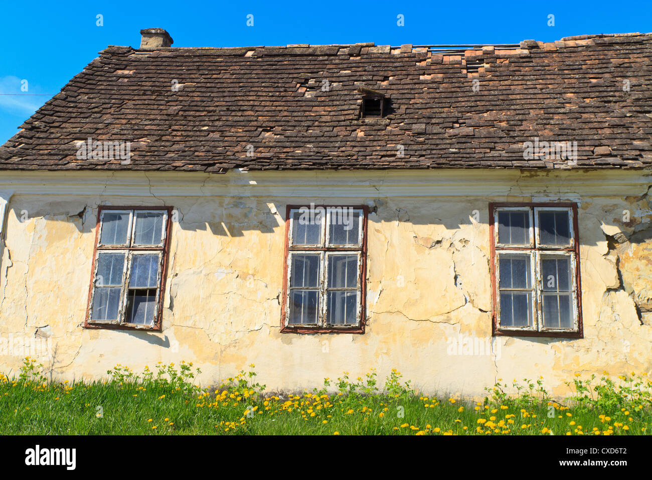 Abandoned old house (detail view) on sunny day Stock Photo