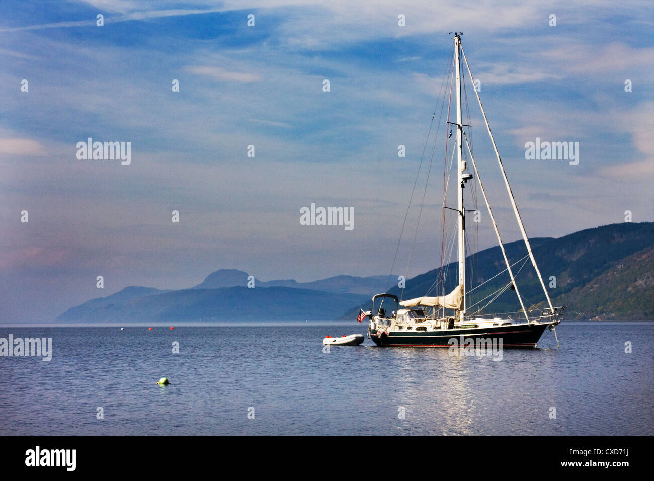 Yacht anchored on Loch Ness near to Dores Village Stock Photo