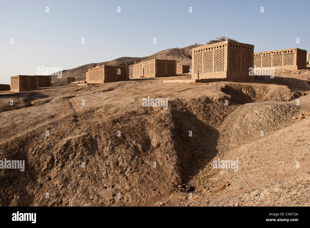 Small earth brick houses used as grape drying sheds in Turpan, Xinjiang, China Stock Photo