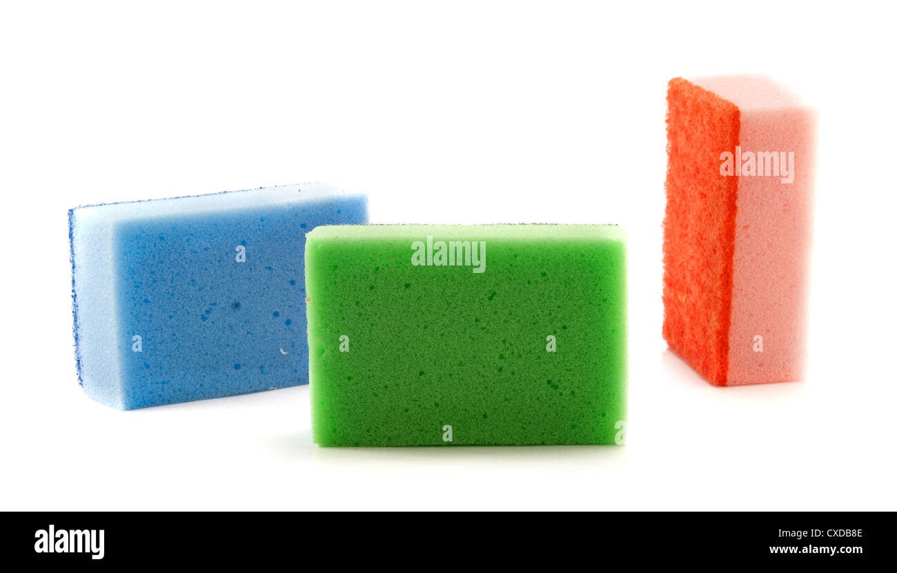 three sponges are isolated on a white background Stock Photo - Alamy