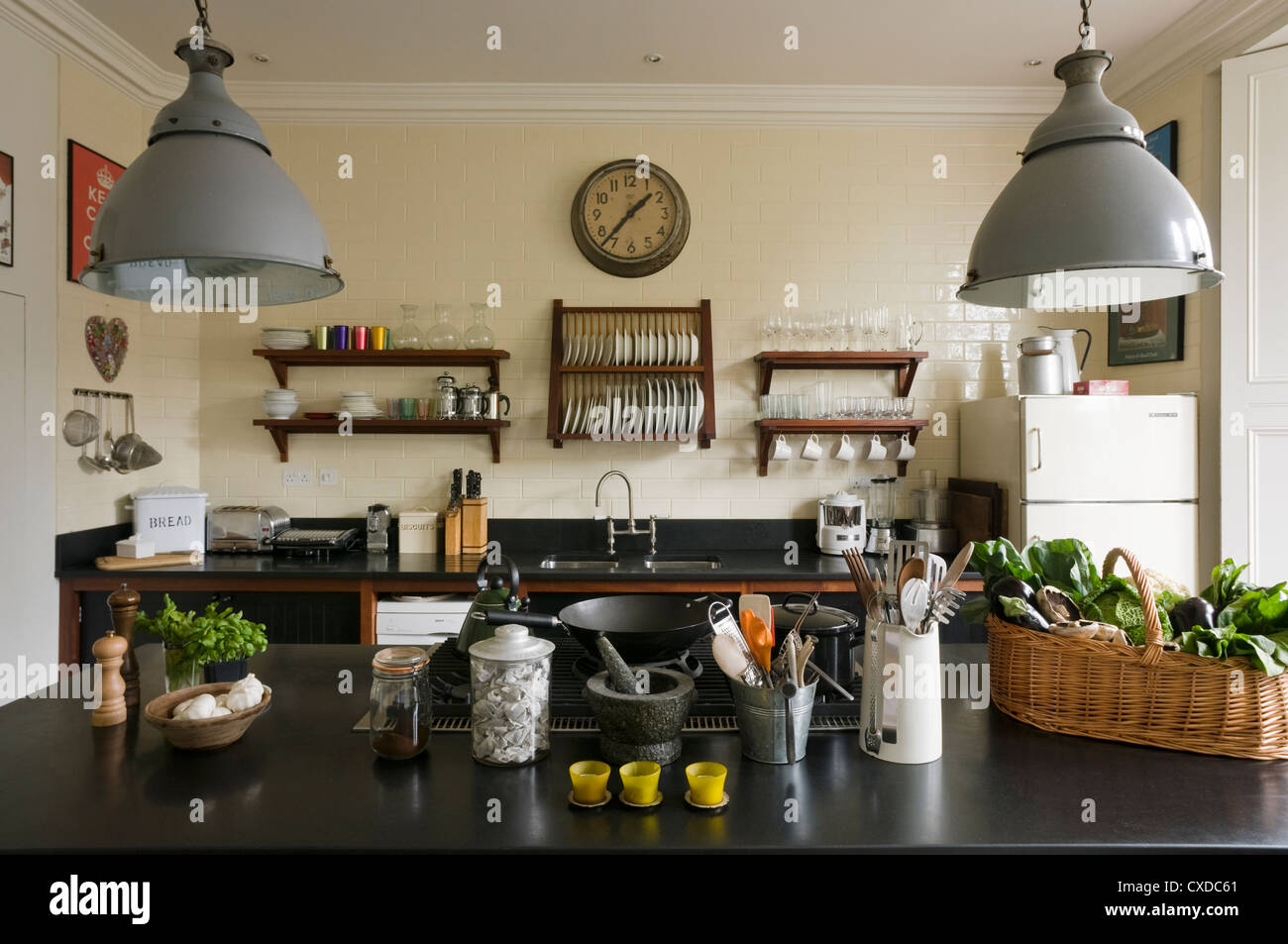 1950s style kitchen with black granite worktops Stock Photo