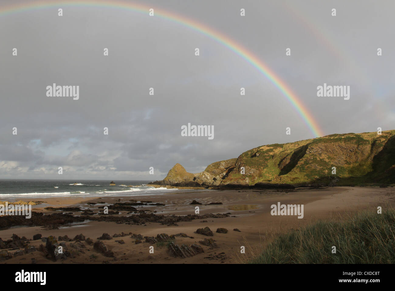 Rainbow over Sunnyside beach Scotland September 2012 Stock Photo