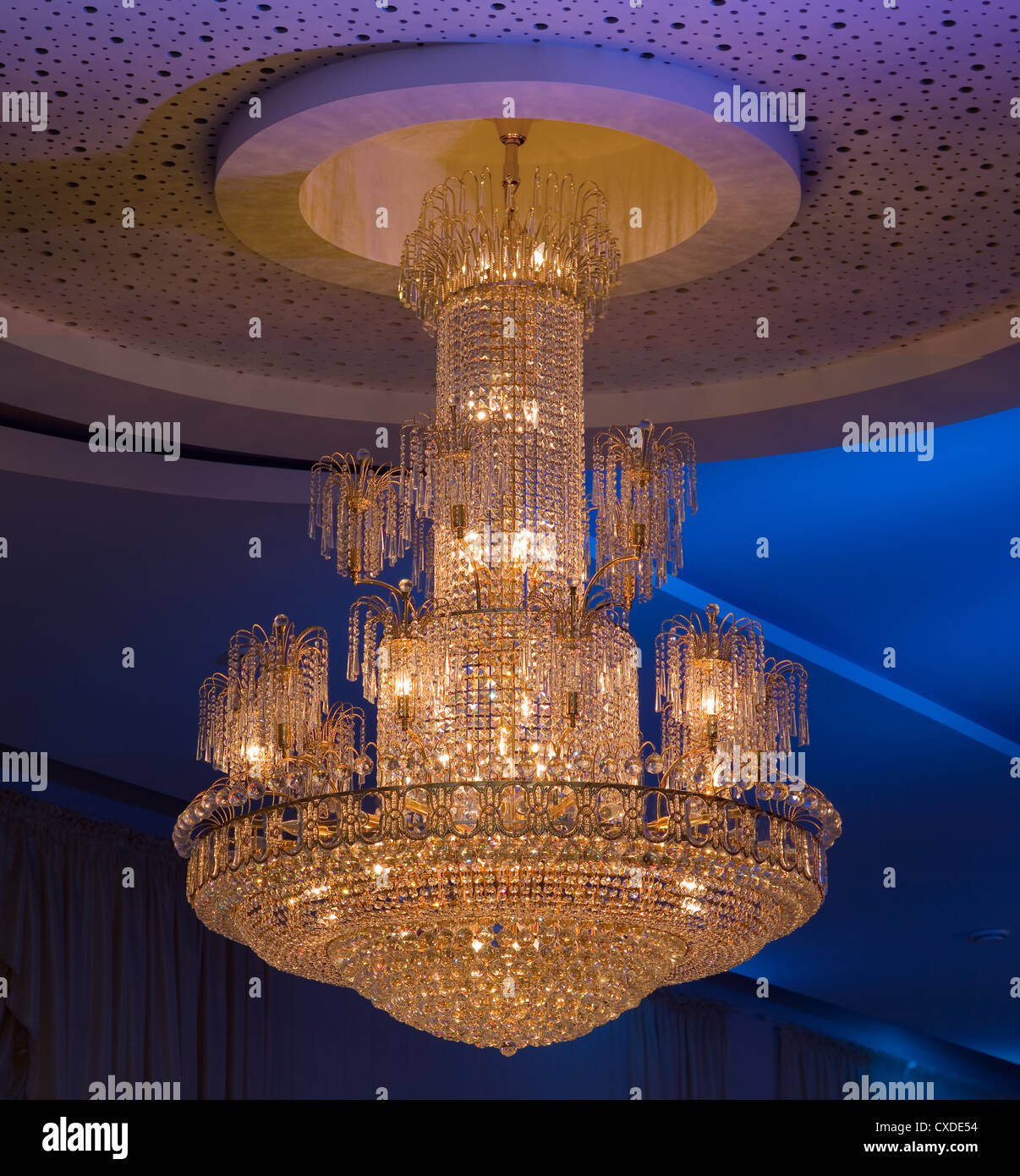 Shimmery Christal Chandelier Hanging from Ceiling Stock Photo