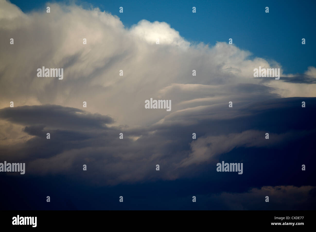 Long thin clouds at the rear end of a thunderstorm. Stock Photo