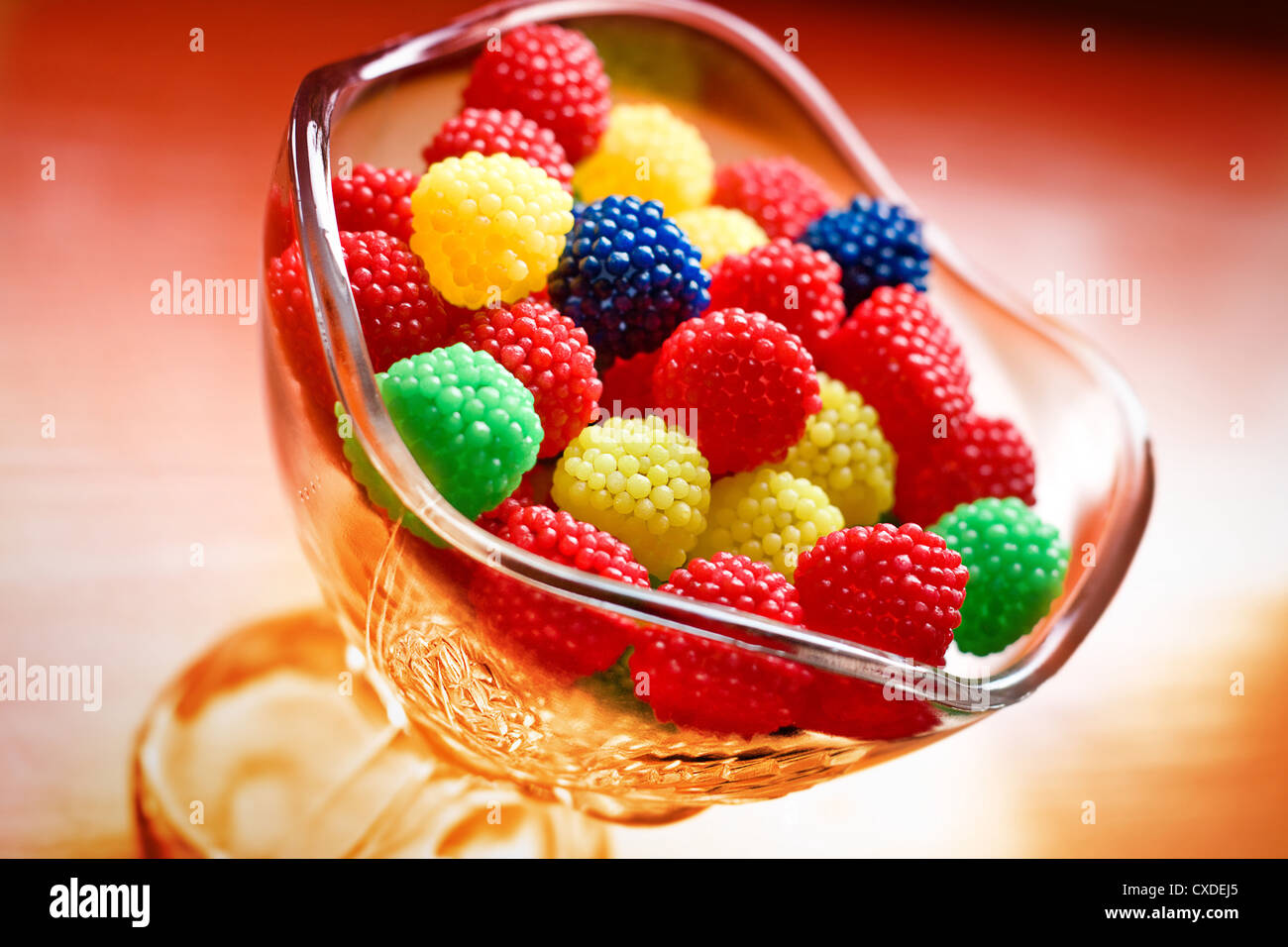 Tasty, chewy, sweet bonbon in glass cup Stock Photo