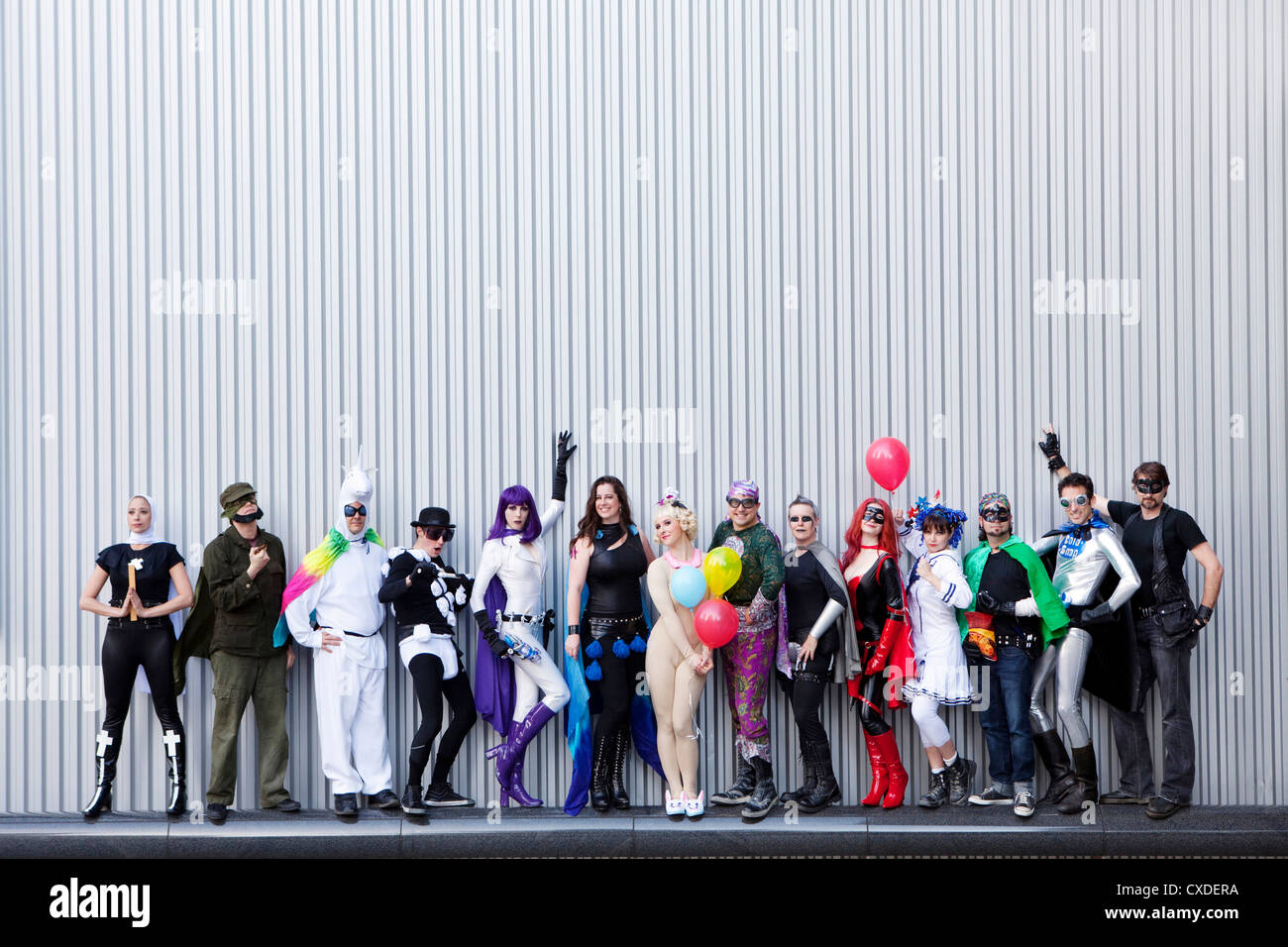 People dressed in superhero costumers Stock Photo