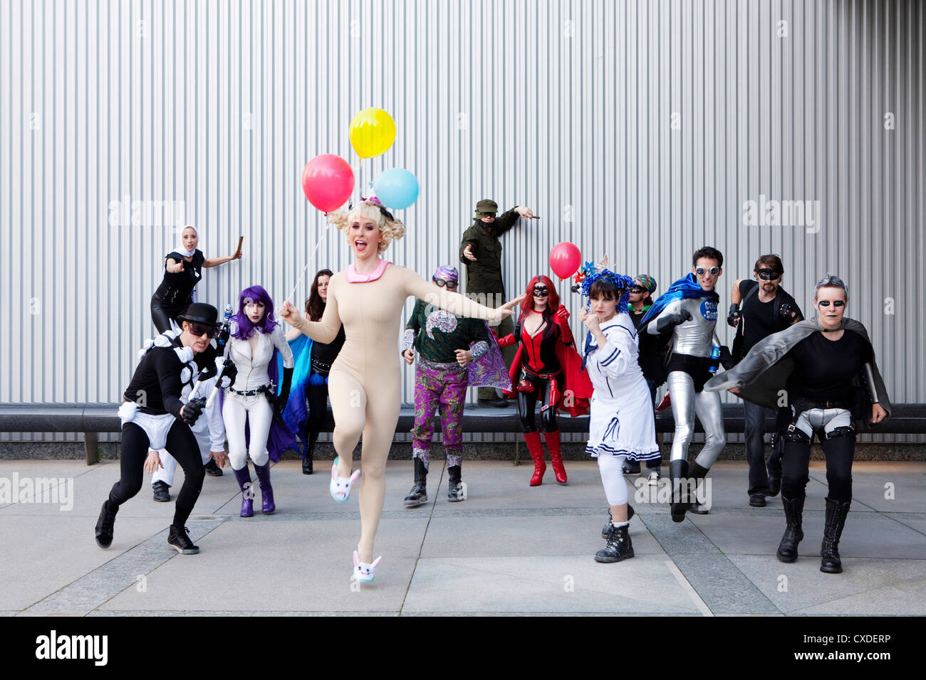 People dressed in superhero costumers Stock Photo