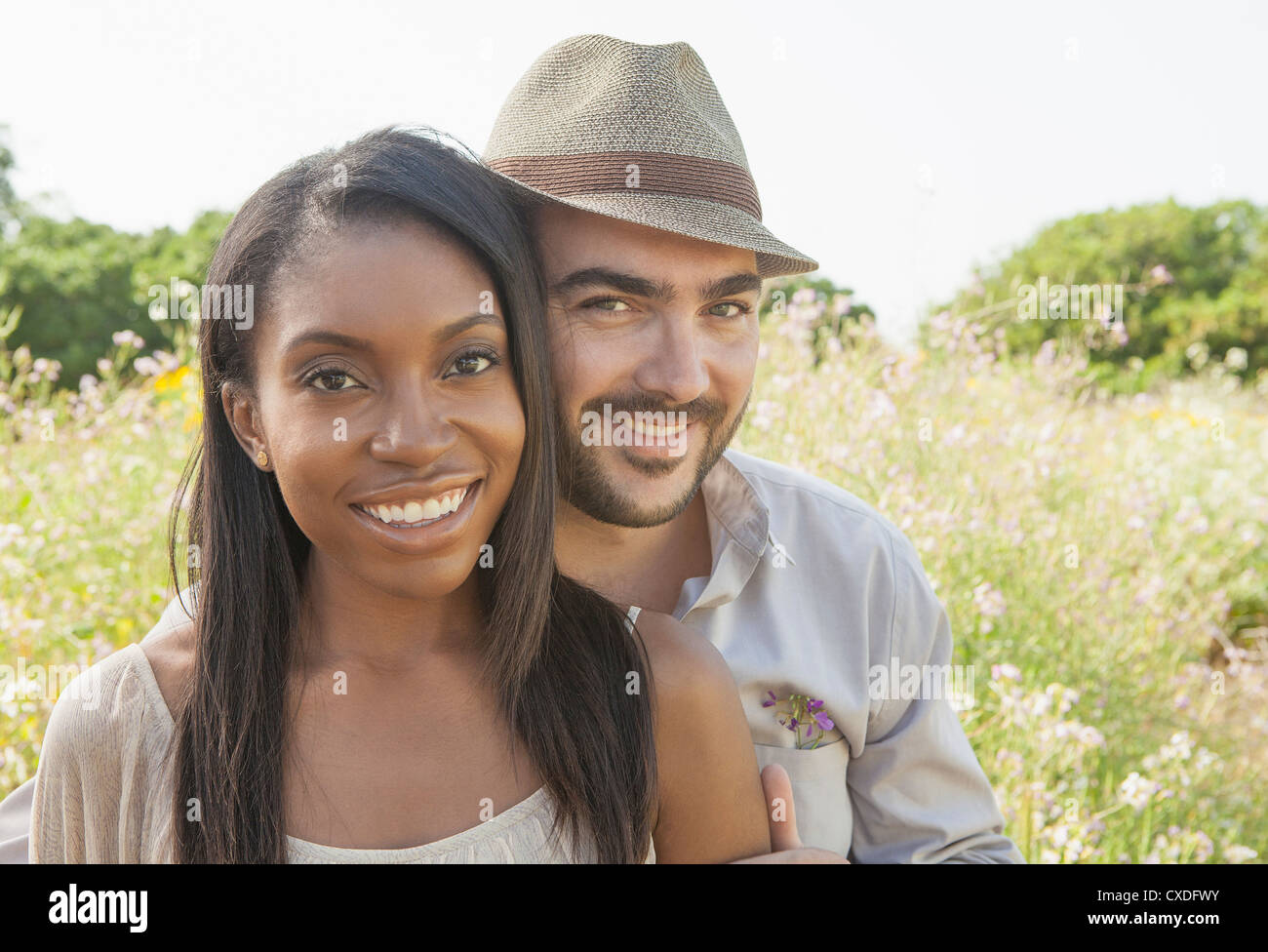 Smiling couple outdoors Stock Photo - Alamy